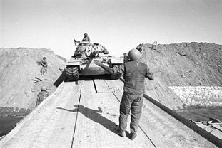 Israeli tanks crossing the Suez Canal during the war