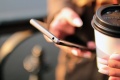 Hands-coffee-smartphone-technology-large.jpg